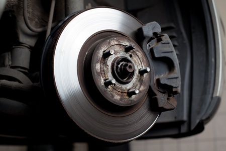 closeup of brake disc mounted on car